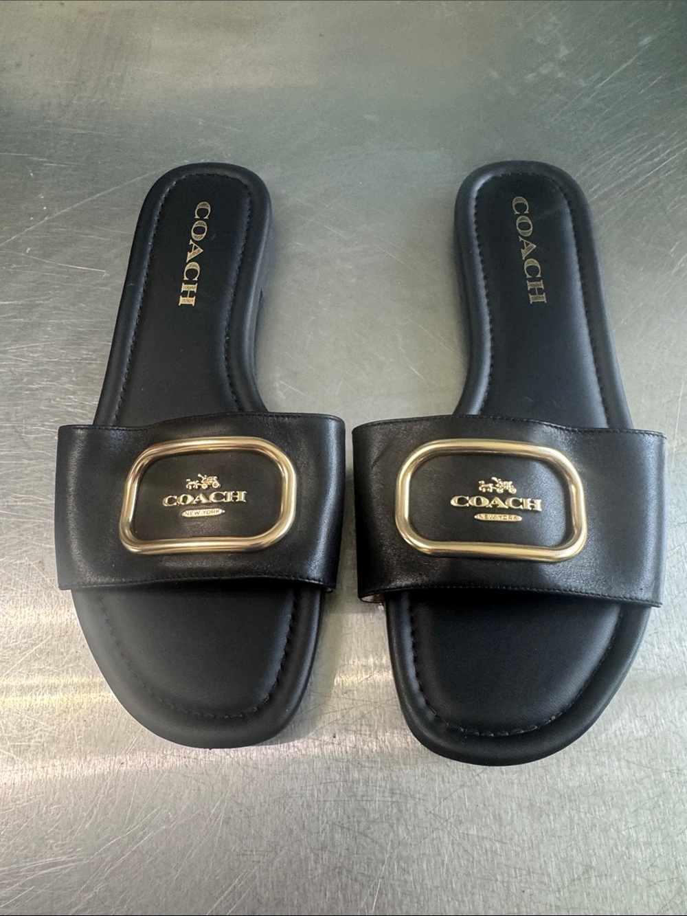 Coach Black Leather Slide Sandals with Gold Logo Plaques